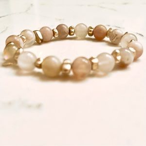 Pale pink and gold bead bracelet